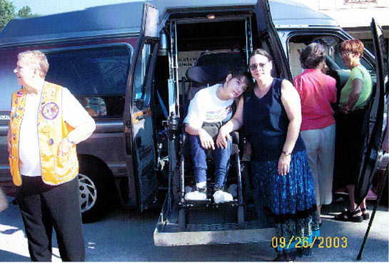 Everyone's admiring the fully loaded handicapped accessible van that was donated by Mr. & Mrs. Brent Smith.